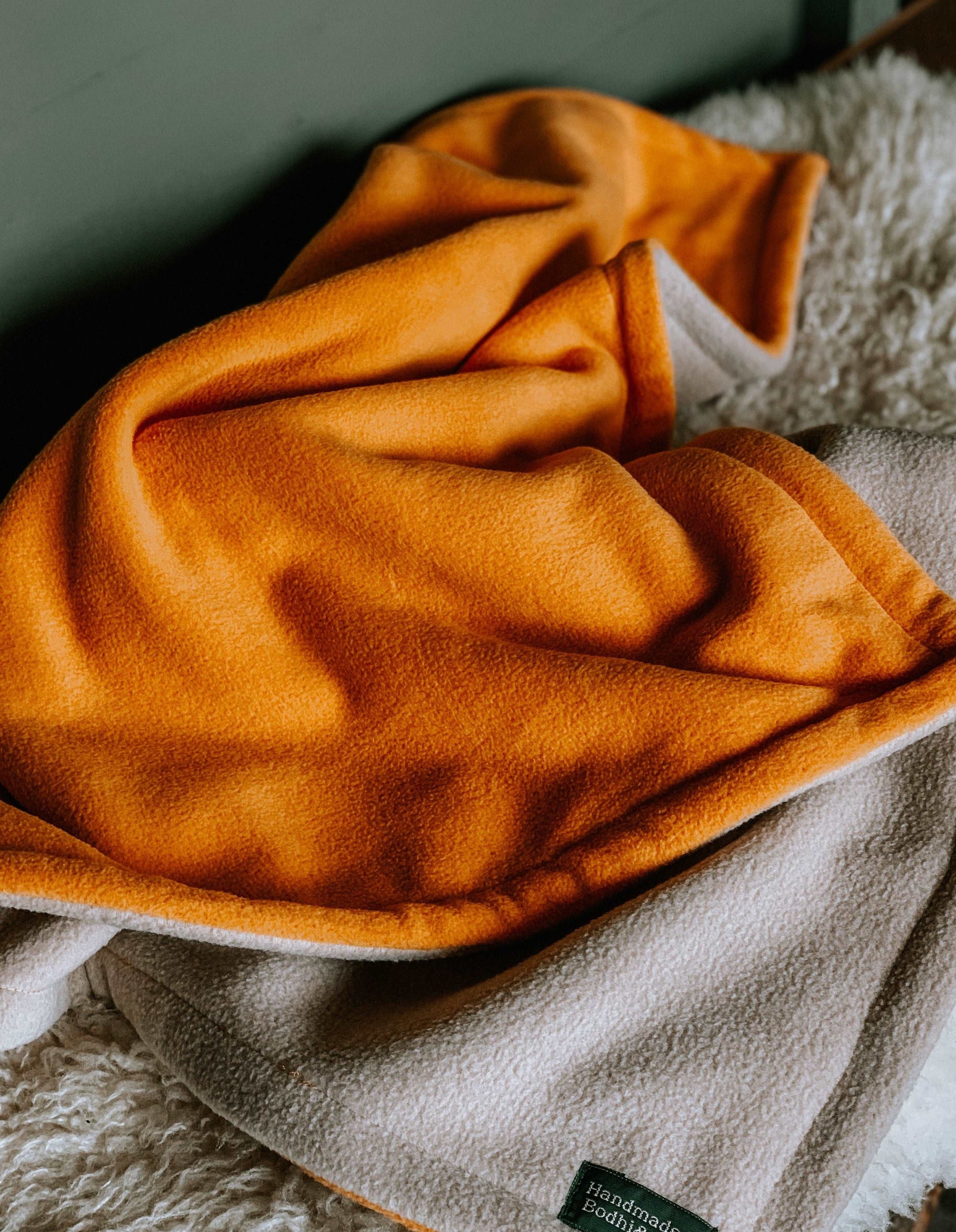 Mustard Bodhi and The Birchtree anti pill fleece dog blanket. Handmade in Scotland.